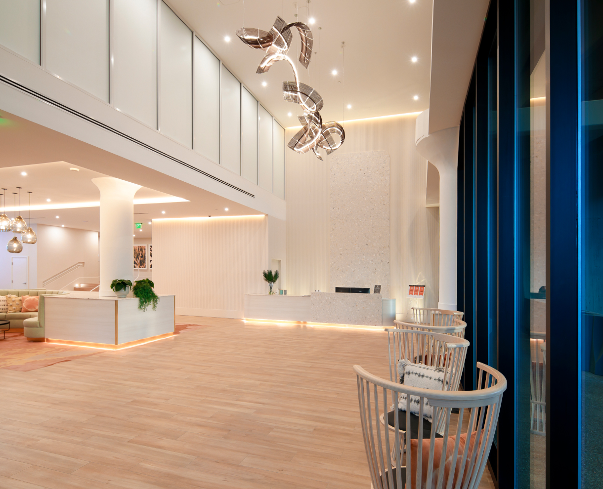 Poplar lobby image with chairs/front desk/artistic light