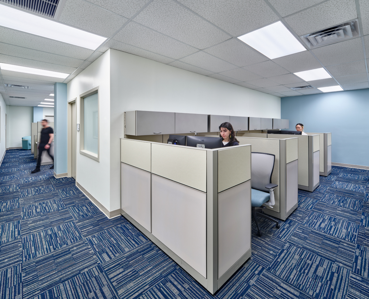 Nemours Rockland Reach office with partitions and people working