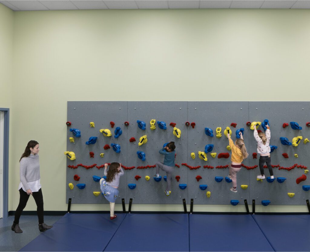 Kids are enjoying indoor rock-climbing