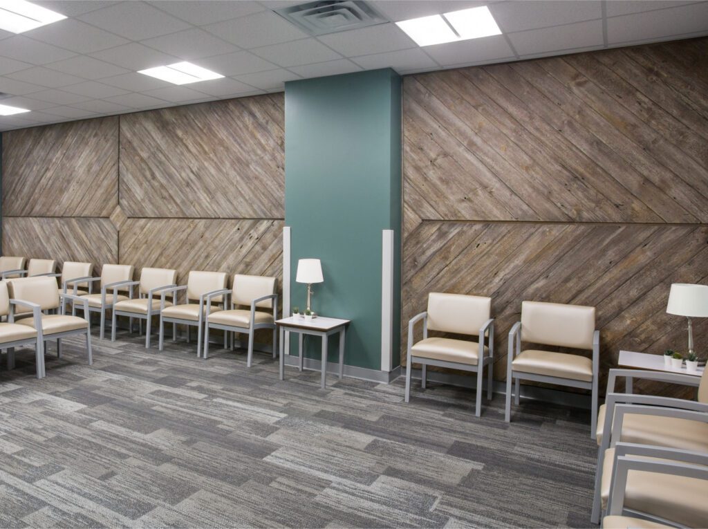 AbsoluteCARE waiting room with a lot of chairs against the wall