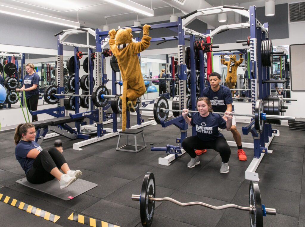 Penn State Athletic Center Gym with people working out