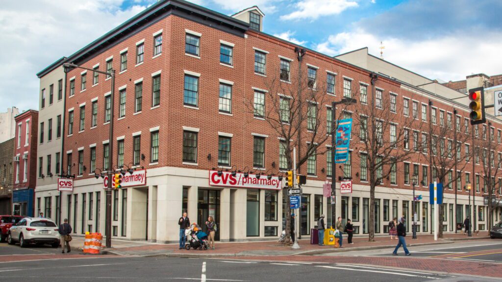 Shirt Corner Apartment exterior with a pharmacy on the first floor