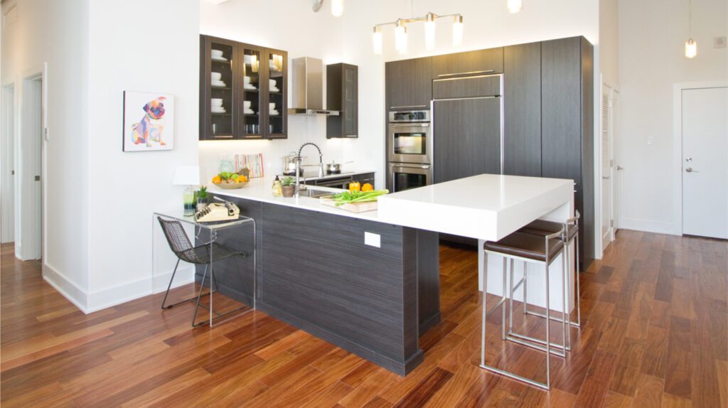 Goldtex Apartment kitchen with a dining table and chairs