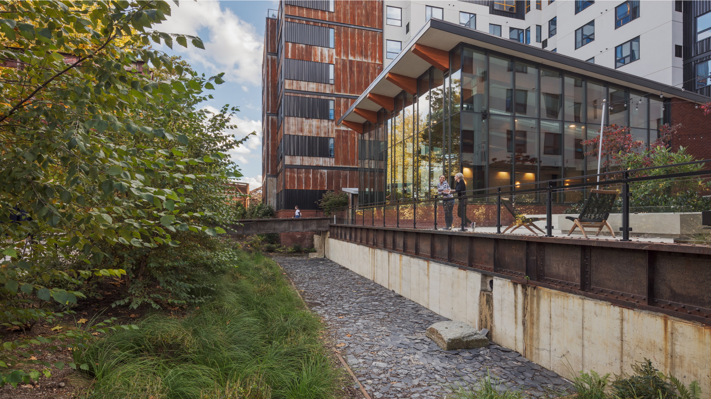 Pencoyd outside view with two people chatting