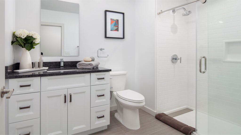 A bathroom interior with white-tone furnitures
