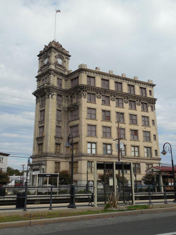 a photo of the site's existing clock tower. it is ornate and lavish in comparison to the industrial factory